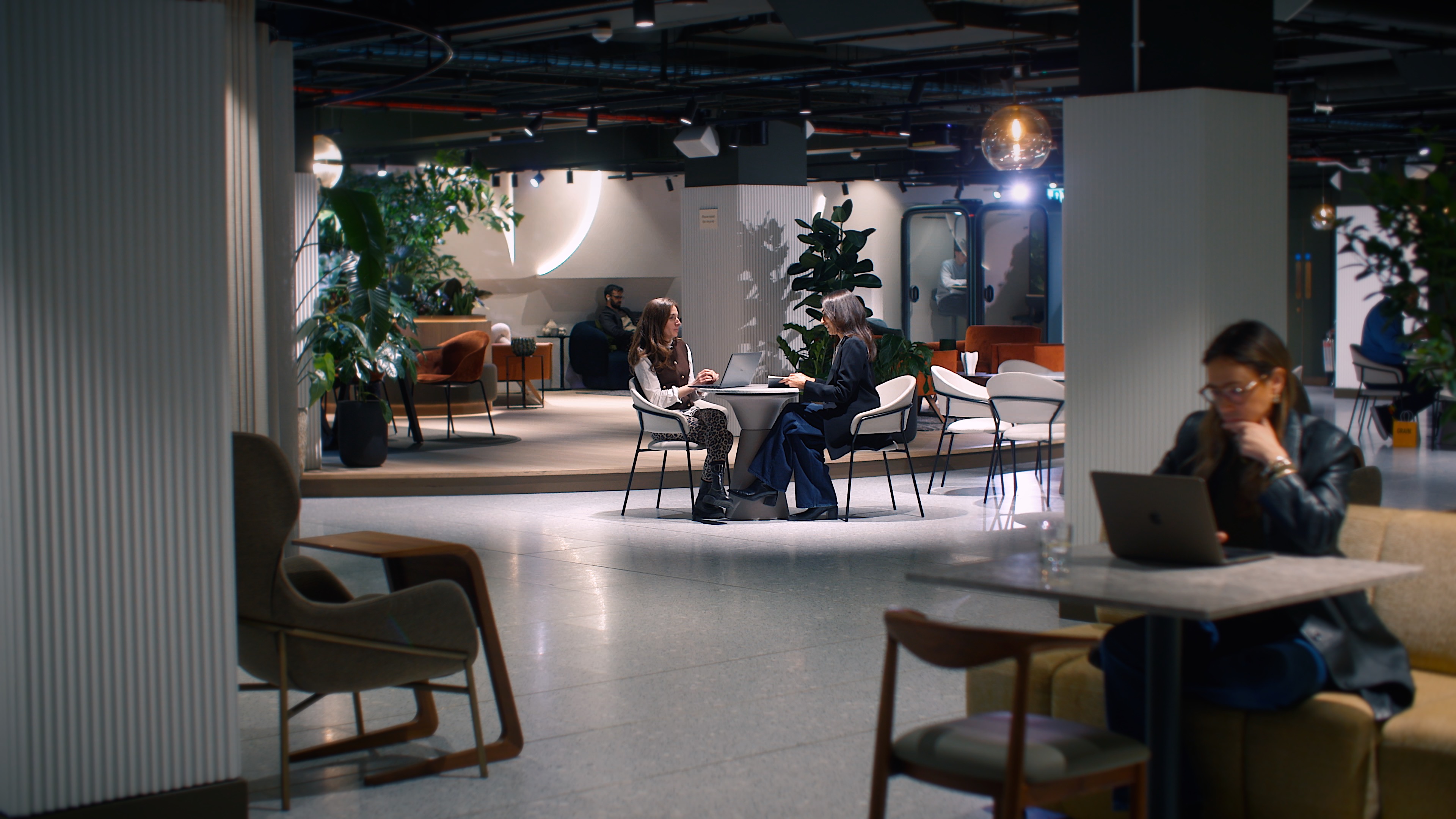 C&C Search consultants at work in a modern open-plan office